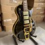 Custom Electric Guitar Yellow Binding Black Color Golden Hardware