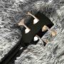 Custom irregular shape body electric guitar in black color