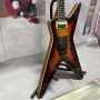 2025 NEW special shaped Dean Bag electric guitar in brown color Black hardware Zebra pickup USA HOT SALE